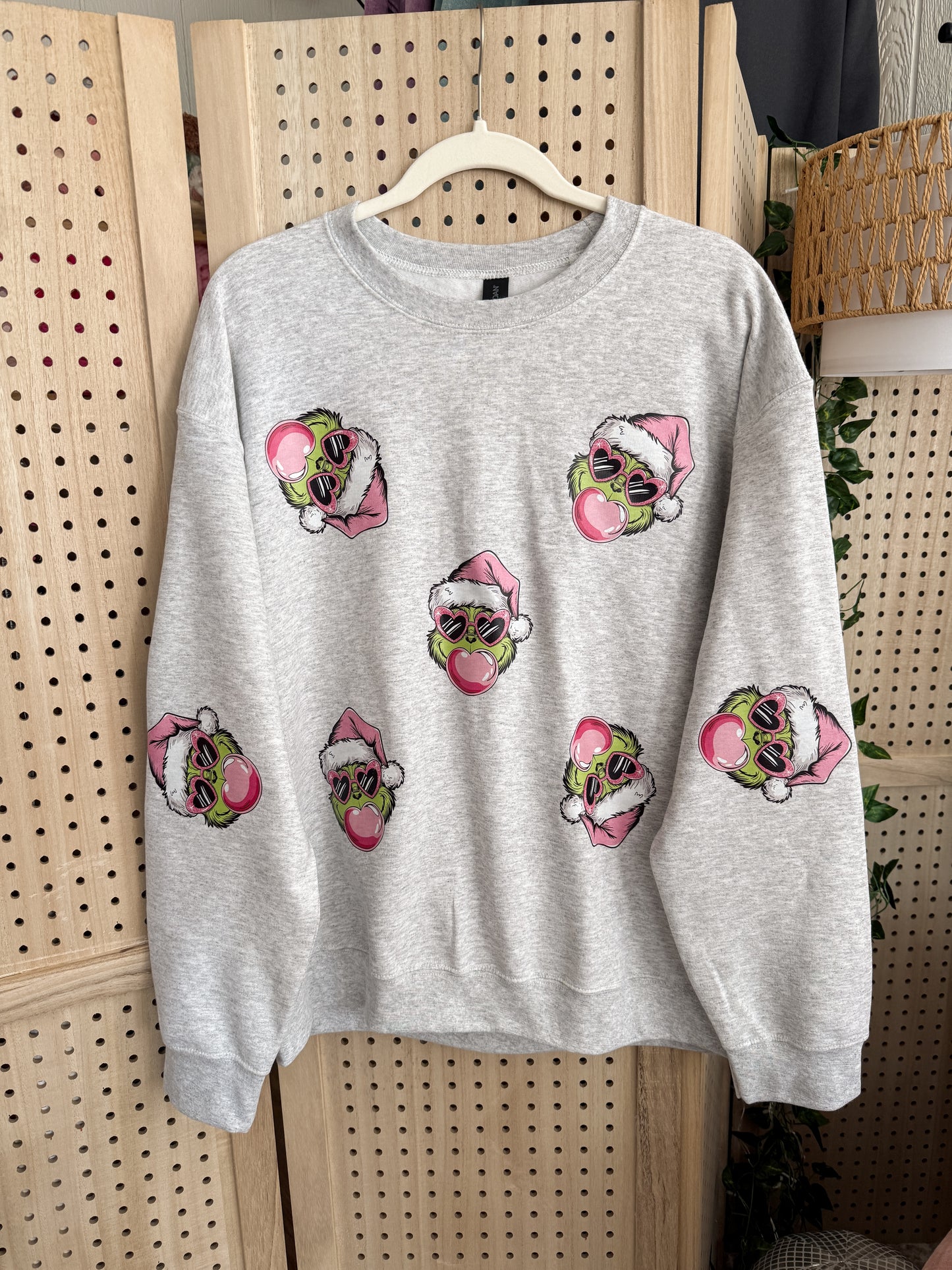 Bubble Grinch Graphic Sweater